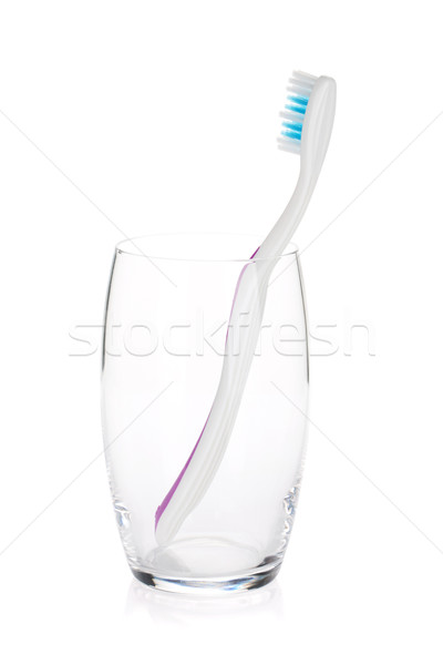 Toothbrush in a glass Stock photo © karandaev