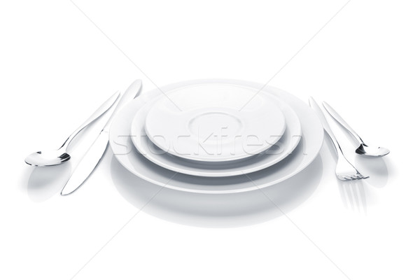 Silverware or flatware set of fork, knife and plates Stock photo © karandaev