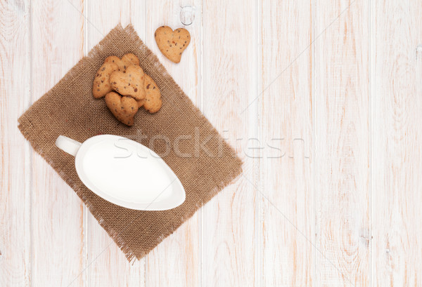 Brocca latte cuore cookies bianco Foto d'archivio © karandaev