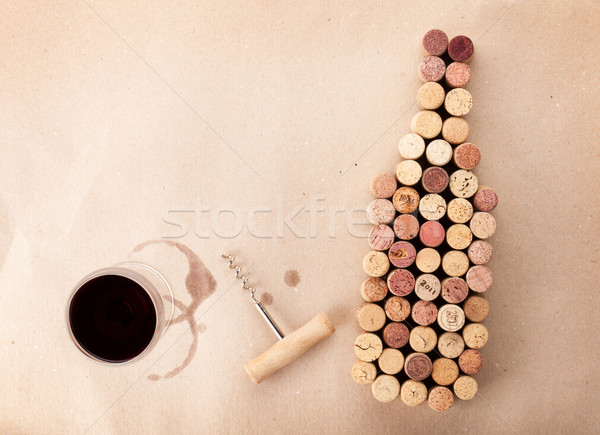 Wine bottle shaped corks, glass of wine and corkscrew Stock photo © karandaev