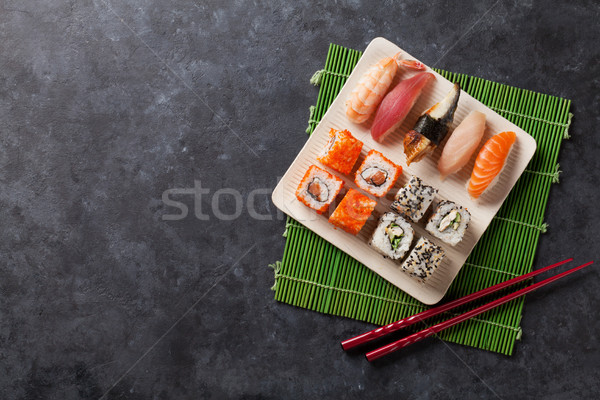 Conjunto sushi maki rolar pedra tabela Foto stock © karandaev