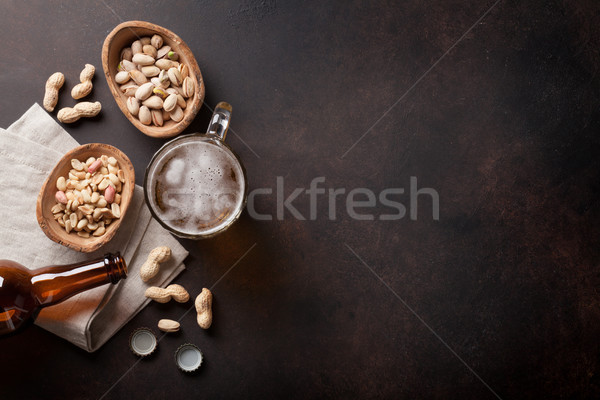 Lager beer and nuts Stock photo © karandaev