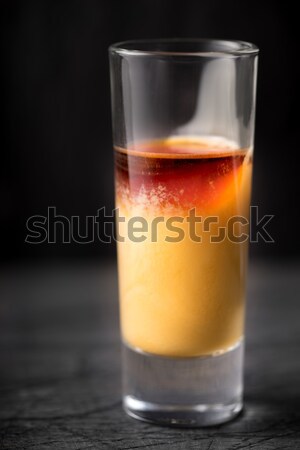 Cocktail of egg and cherry liqueur on the dark background Stock photo © Karpenkovdenis