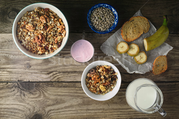Breakfast with granola on the wooden table top view Stock photo © Karpenkovdenis
