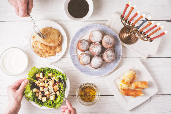 Hanukkah dinner with traditional dishes top view Stock photo © Karpenkovdenis