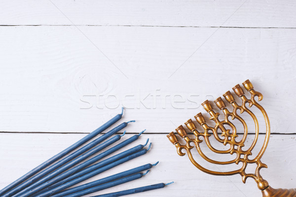 Hanukkah menorah and candles on the white wooden table Stock photo © Karpenkovdenis