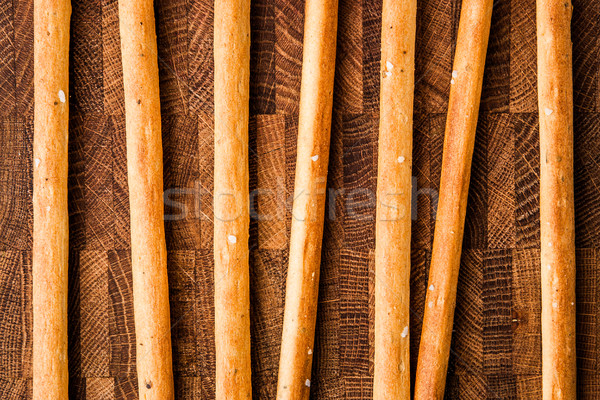 Salted bread sticks lie on a chopping board Stock photo © Karpenkovdenis
