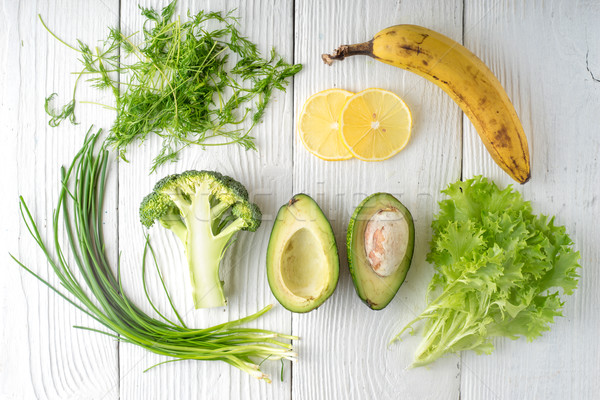 Green rustic and banana on white boards Stock photo © Karpenkovdenis