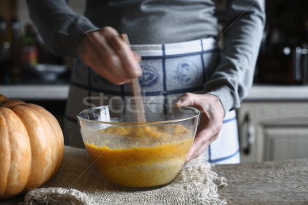 Mixing dough for pumpkin dump cake in the glass bowl horizontal Stock photo © Karpenkovdenis