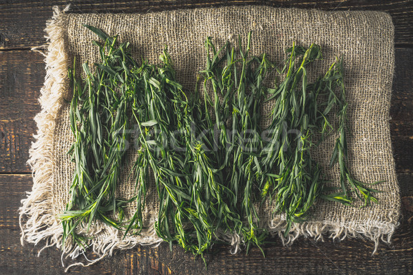Tarragon on the canvas on the wooden table top view Stock photo © Karpenkovdenis