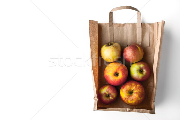Stock photo: Apples inside a paper bag