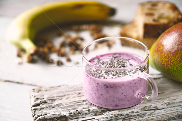 Farm yogurt with chia in a jar, granola, banana Stock photo © Karpenkovdenis