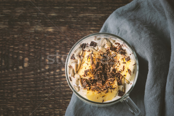 Stock photo: Natural yogurt with banana, chocolate and sunflower seeds