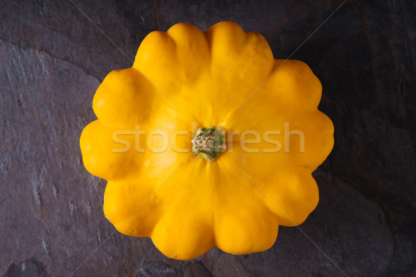 Yellow fresh squash patty pan on the dark stone background top view Stock photo © Karpenkovdenis