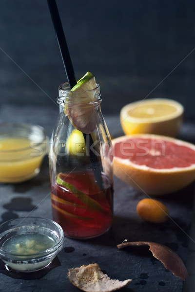 Foto stock: Botella · agrios · jugo · oscuro · piedra · frutas