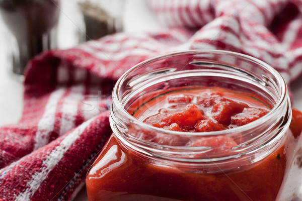 Pureed tomatoes in a glass jar Stock photo © Karpenkovdenis