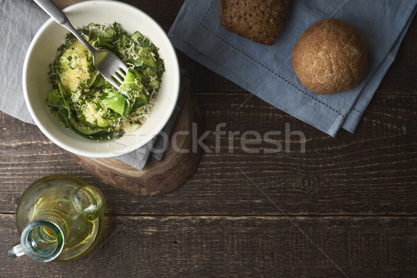 Stock photo: Zucchini noodles with cheese and olive oil on the wooden table top view