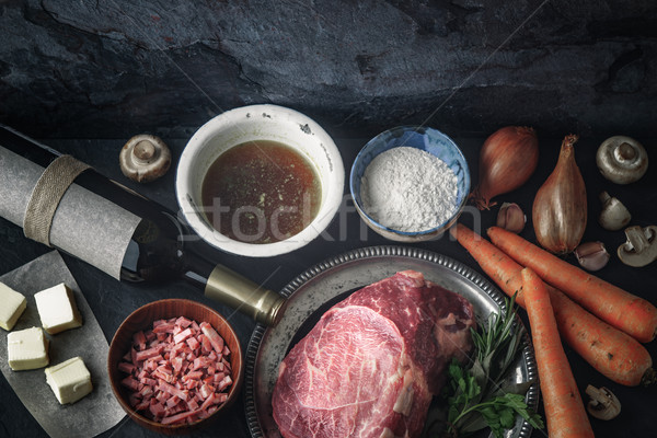 Ingredients for Boeuf Bourguignon on the  dark stone  table top view Stock photo © Karpenkovdenis