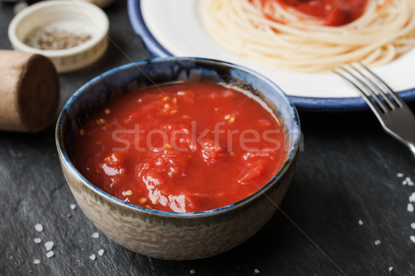 Pureed tomatoes in a ceramic dish on a table Stock photo © Karpenkovdenis