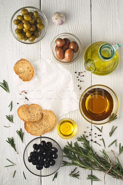 оливкового масла хлеб оливками белый деревянный стол Сток-фото © Karpenkovdenis