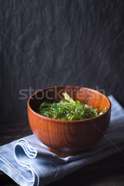 Chuka salad  in the wooden bowl  on the dark background vertical Stock photo © Karpenkovdenis