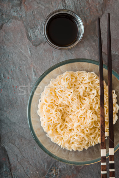 Soup Ramen noodles in glass bowl and sause on tte gray table Stock photo © Karpenkovdenis