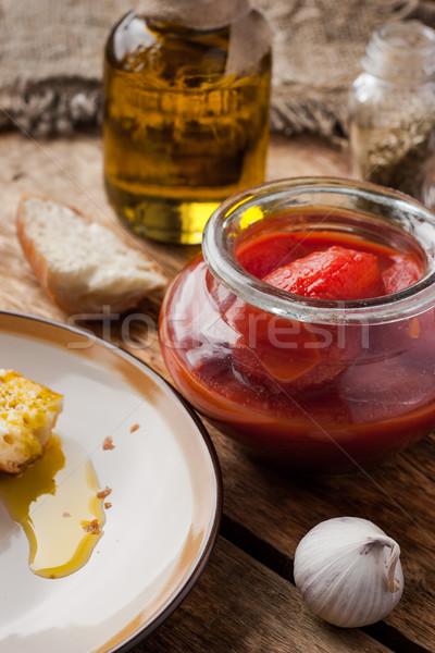 Canned tomatoes in a glass jar Stock photo © Karpenkovdenis