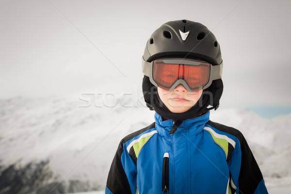 Young skier on winter background Stock photo © kasjato
