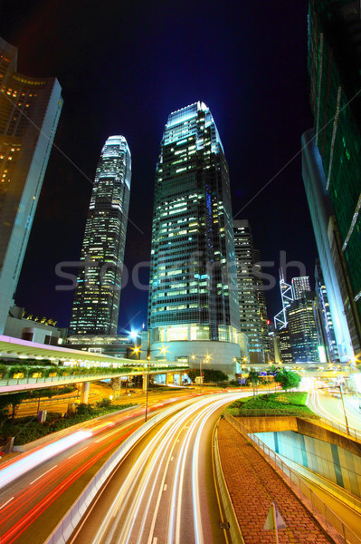 Traffic in city at night, it shows the busy business environment Stock photo © kawing921