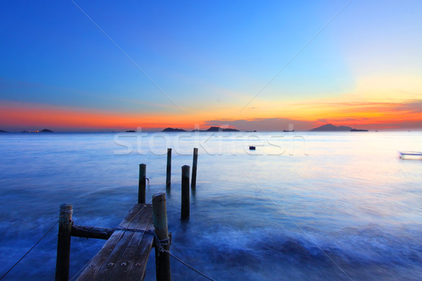 Puesta de sol muelle Hong Kong cielo nubes Foto stock © kawing921