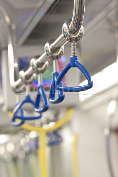 Handles for standing passenger inside a train Stock photo © kawing921