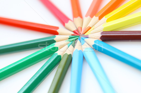 Color pencils in arrange in color wheel colors on white backgrou Stock photo © kawing921