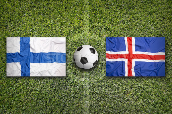 Finland vs. Iceland flags on soccer field Stock photo © kb-photodesign