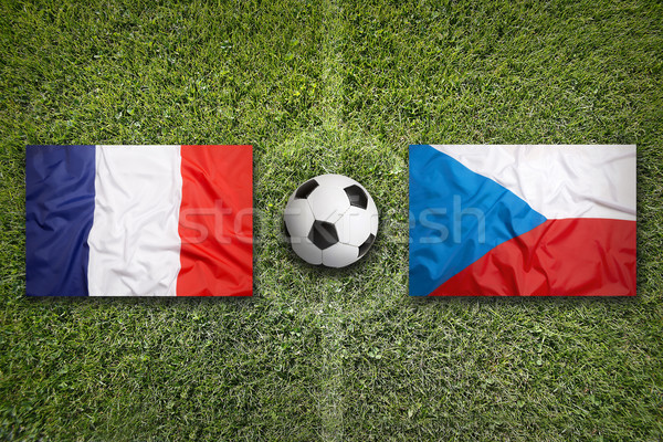 Stock photo: France vs. Czech Republic flags on soccer field