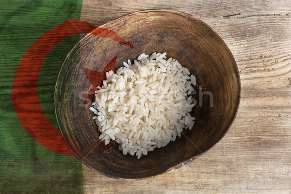 Poverty concept, bowl of rice with Algeria flag       Stock photo © kb-photodesign