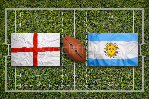 Stock photo: England vs. Argentina flags on rugby field