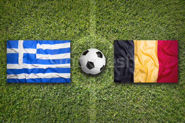 Greece vs. Belgium flags on soccer field Stock photo © kb-photodesign