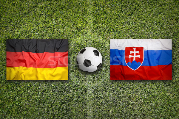 Németország vs Szlovákia zászlók futballpálya zöld Stock fotó © kb-photodesign