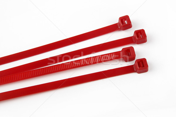 Cable ties in red Stock photo © kb-photodesign
