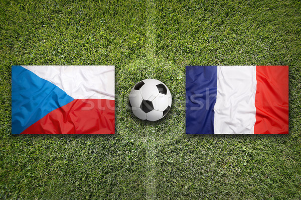 Stock photo: Czech Republic vs. France flags on soccer field
