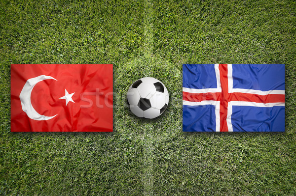 Turkije vs IJsland vlaggen voetbalveld groene Stockfoto © kb-photodesign