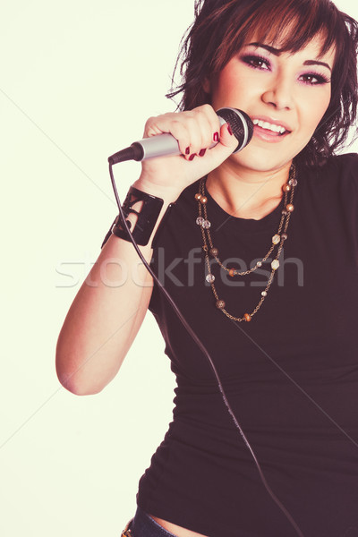 Stock photo: Beautiful Singing Woman