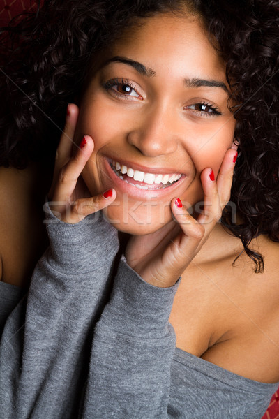 Gyönyörű mosolyog afroamerikai nő közelkép lány kezek Stock fotó © keeweeboy