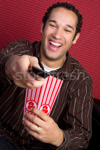 Tv popcorn homme regarder manger alimentaire Photo stock © keeweeboy