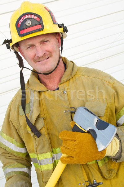 Firefighter Holding Axe Stock photo © keeweeboy