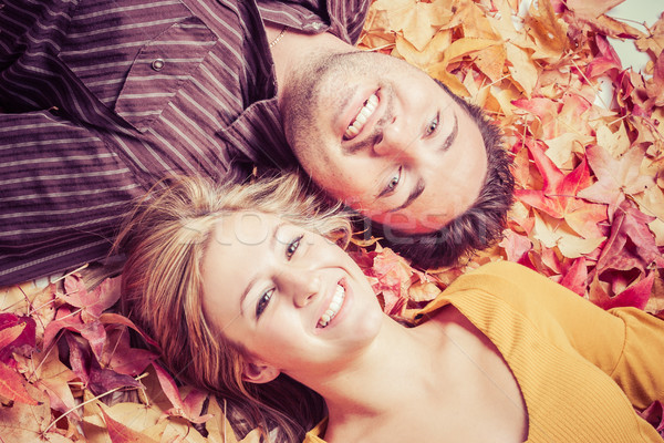 Couple in Autumn Leaves Stock photo © keeweeboy