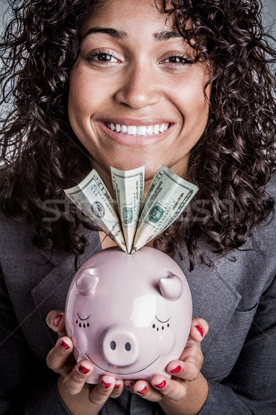 Donna salvadanaio donna sorridente soldi ragazza Foto d'archivio © keeweeboy