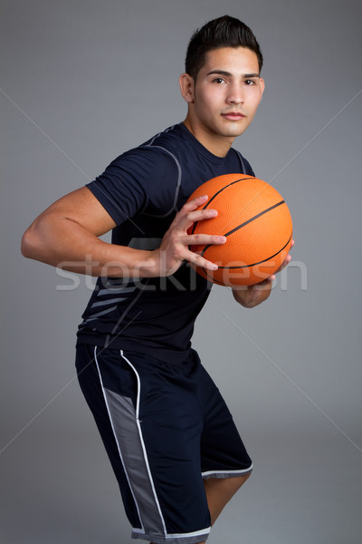 Kosárlabdázó fiatal férfi fitnessz narancs dolgozik Stock fotó © keeweeboy