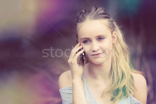 Blond Girl on Phone Stock photo © keeweeboy