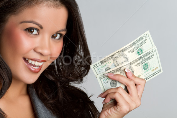 Woman Holding Money Stock photo © keeweeboy